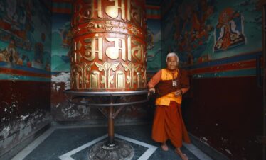 old monk in a temple in ladakh