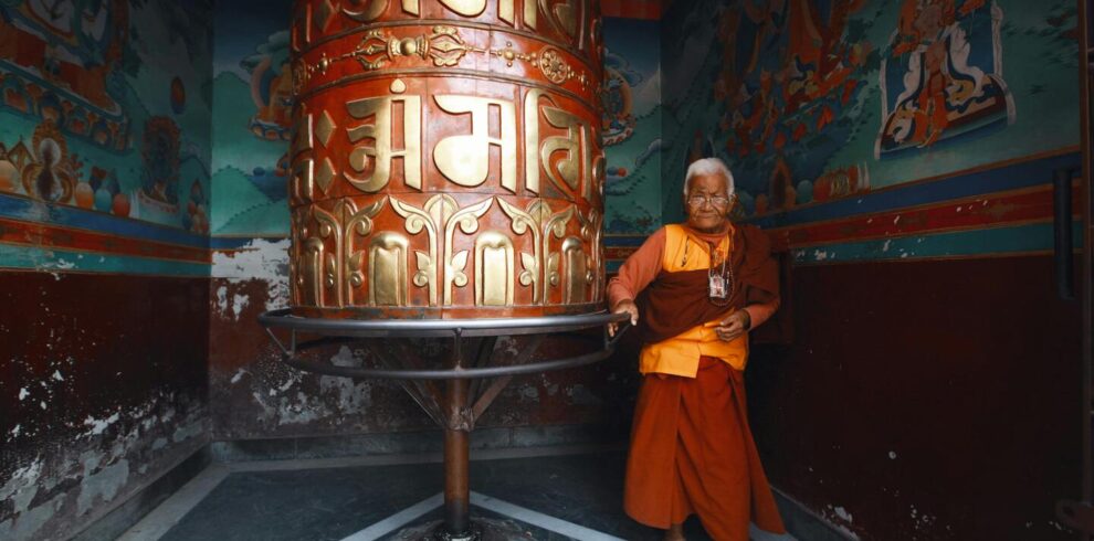 old monk in a temple in ladakh