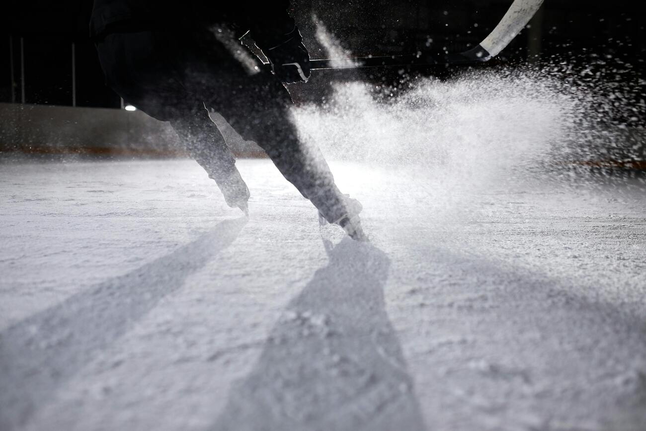 a person ice skating on snow
